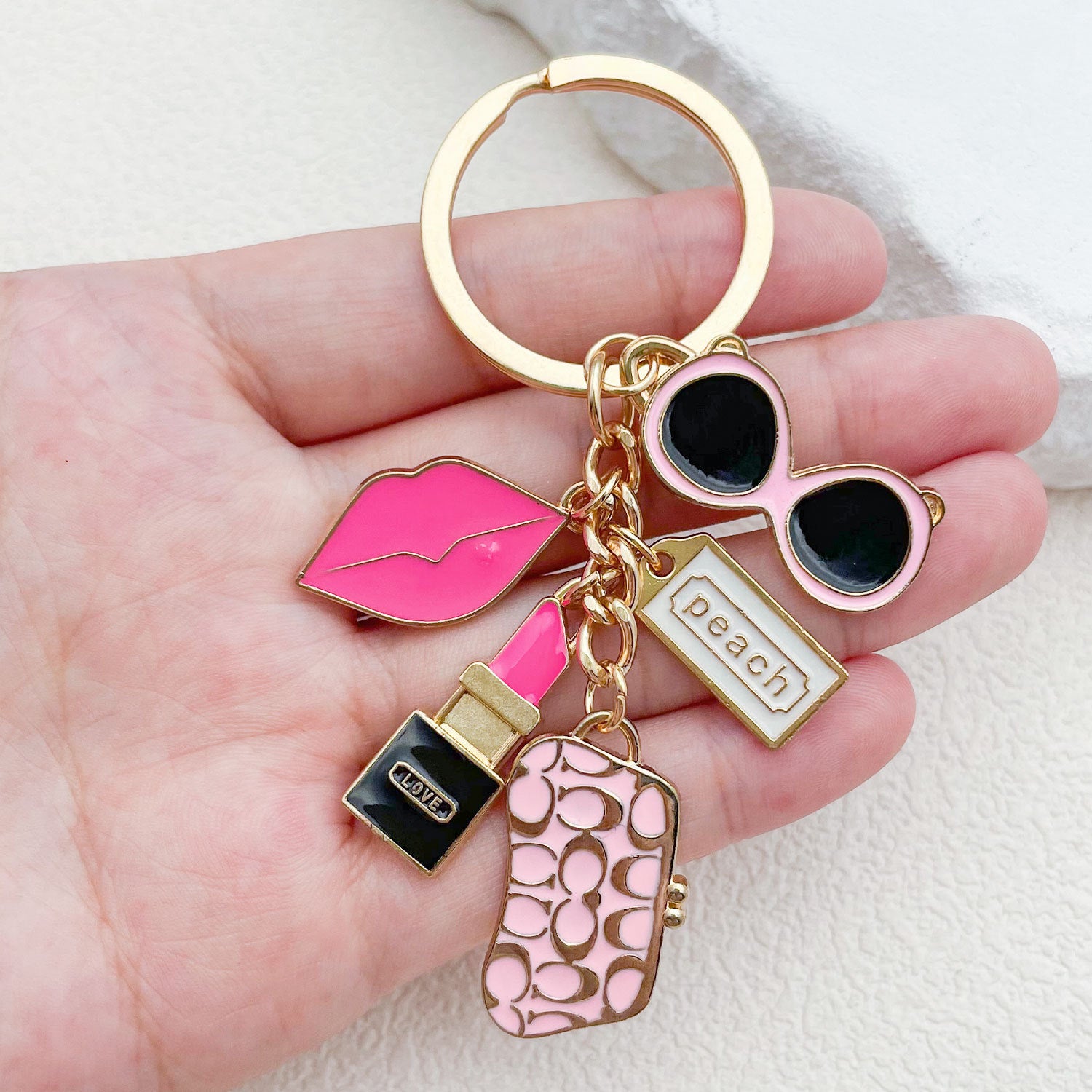 Wholesale  new ladies bag lipstick sunglasses keychain