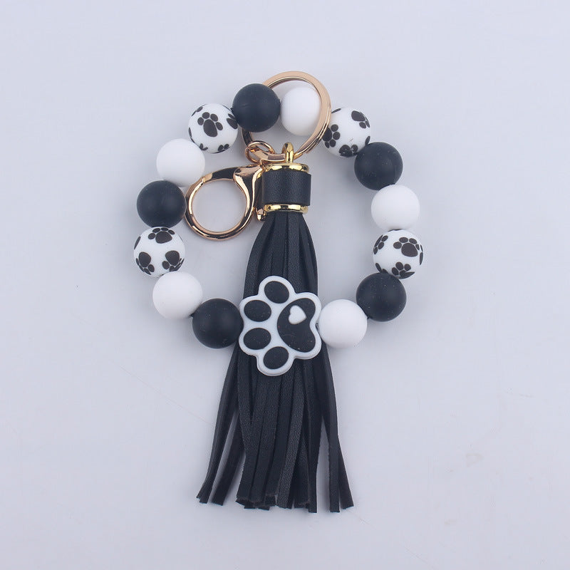 Wholesale Chic Silicone Bead Dog Paw Bracelet Keychain With Leather Tassel Fashion Gift For Resale