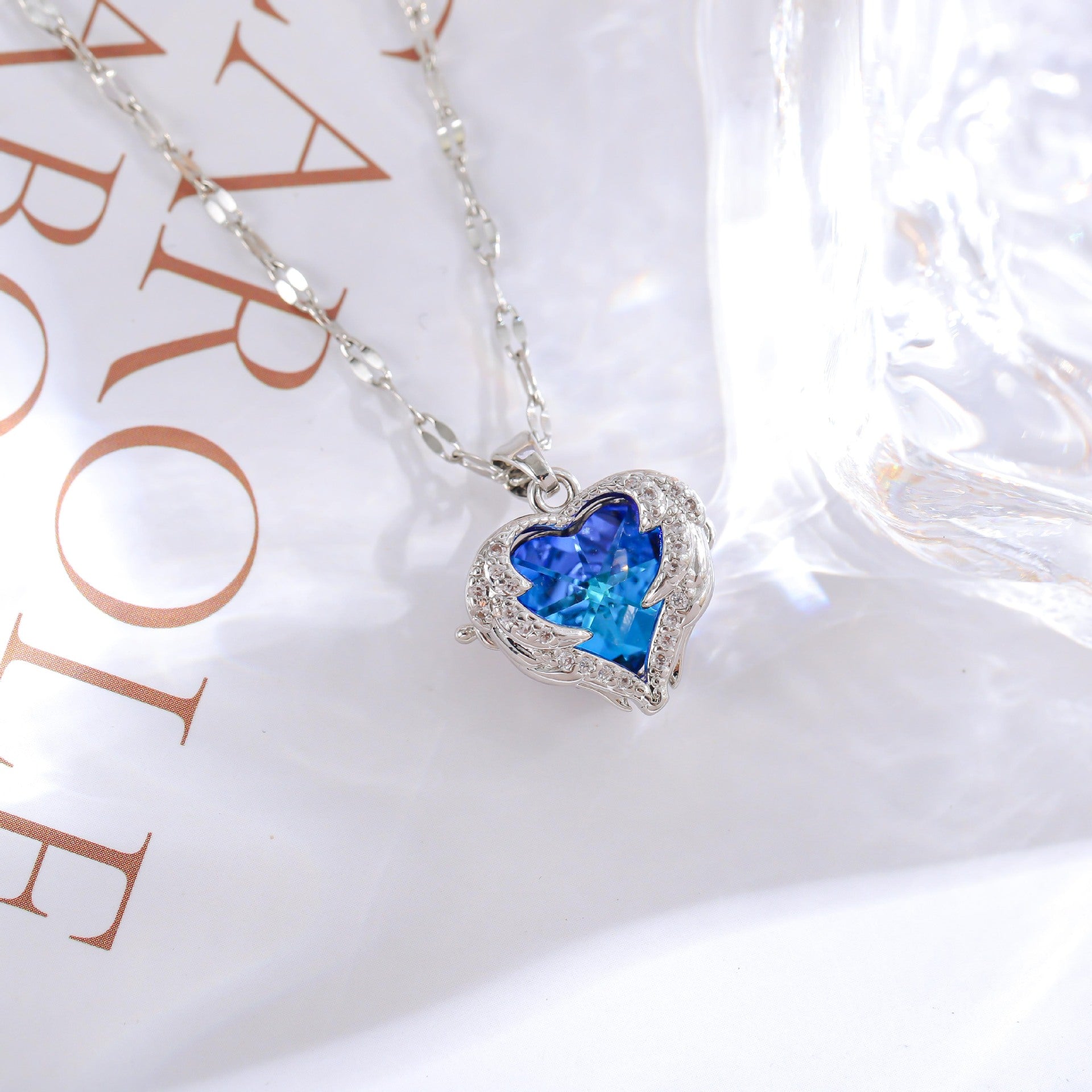 Wholesale titanium steel gold plated silver plated blue crystal ocean heart necklace