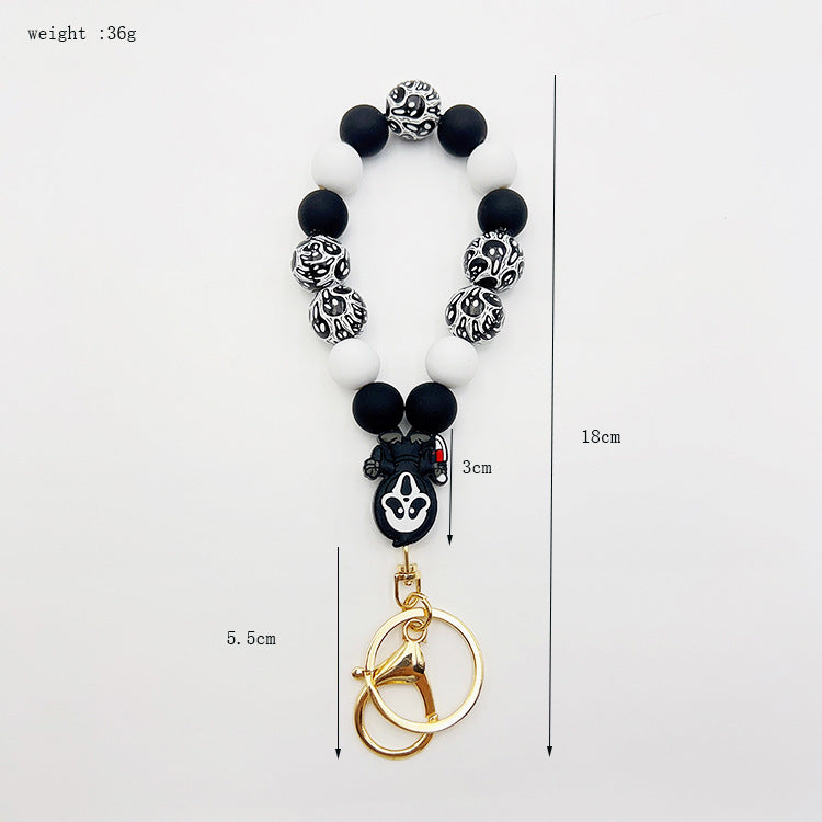 Wholesale Silicone Pumpkin Cow Ghost Dog Paw Wooden Bead Bracelet Keychain