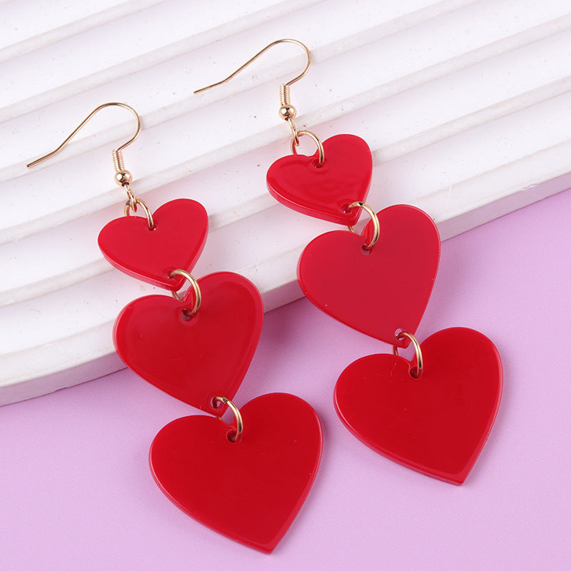Wholesale Asymmetric long triple heart Acrylic Earrings
