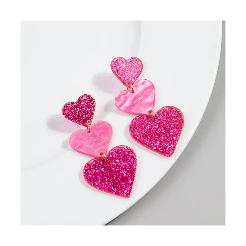 Wholesale  Heart-shaped Stud Earrings With a Triple Dangle Design.