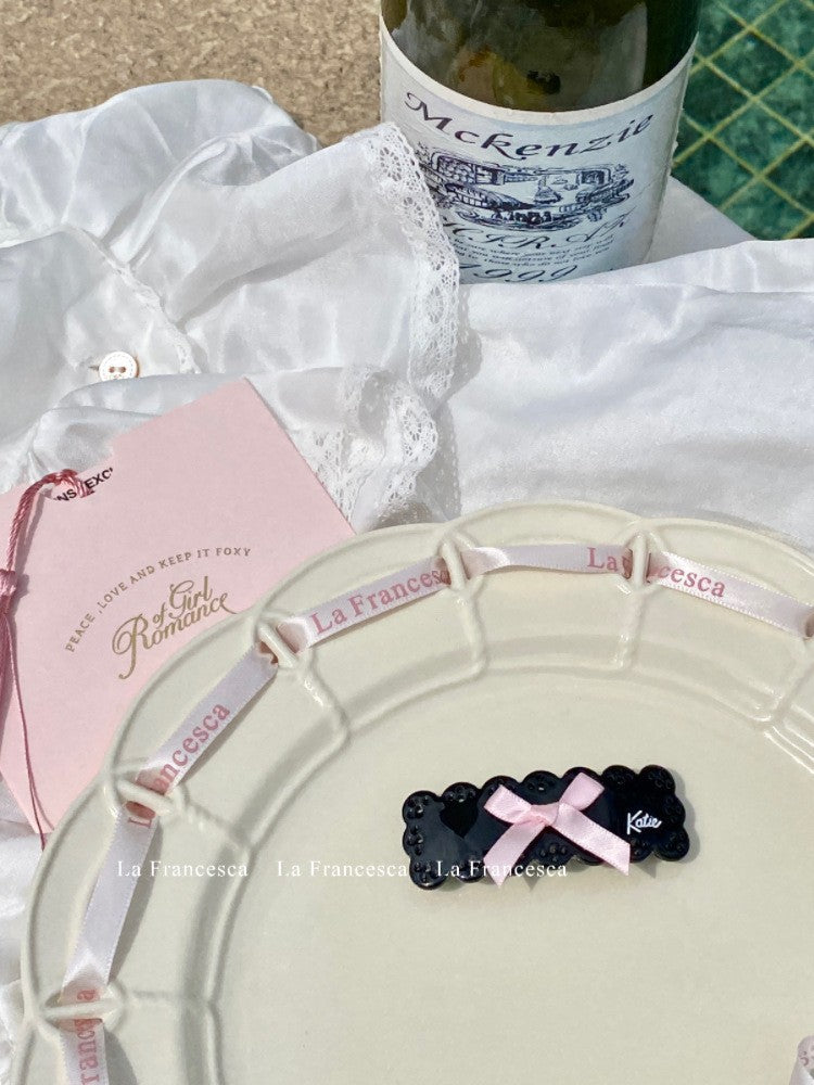 Wholesale Sweet and Cool Bow Hollow Letter Clip