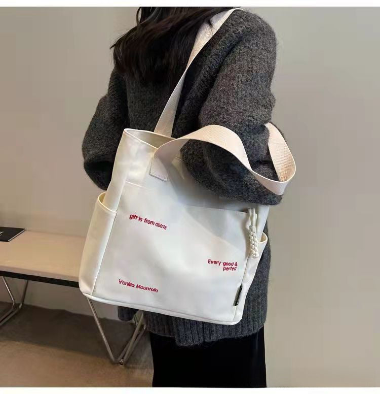Wholesale Canvas bag shoulder bag large capacity commuter bag handbag bag