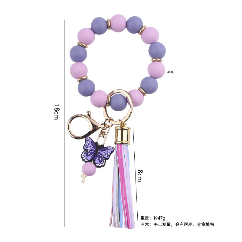 Wholesale PU Tassel Beaded Cartoon Butterfly Pendant Rainbow Leather Keychain
