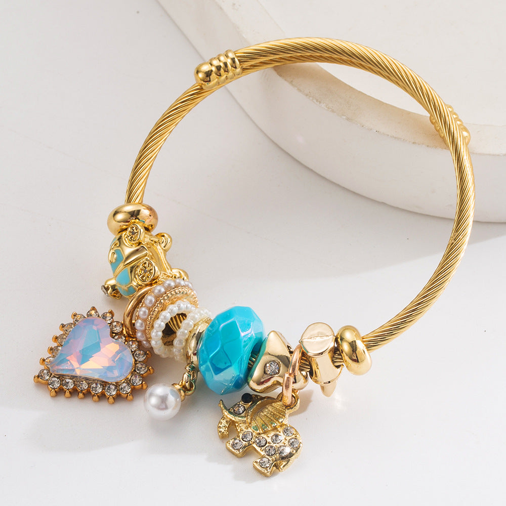 Wholesale Diamond encrusted elephant heart pendant with adjustable bracelet