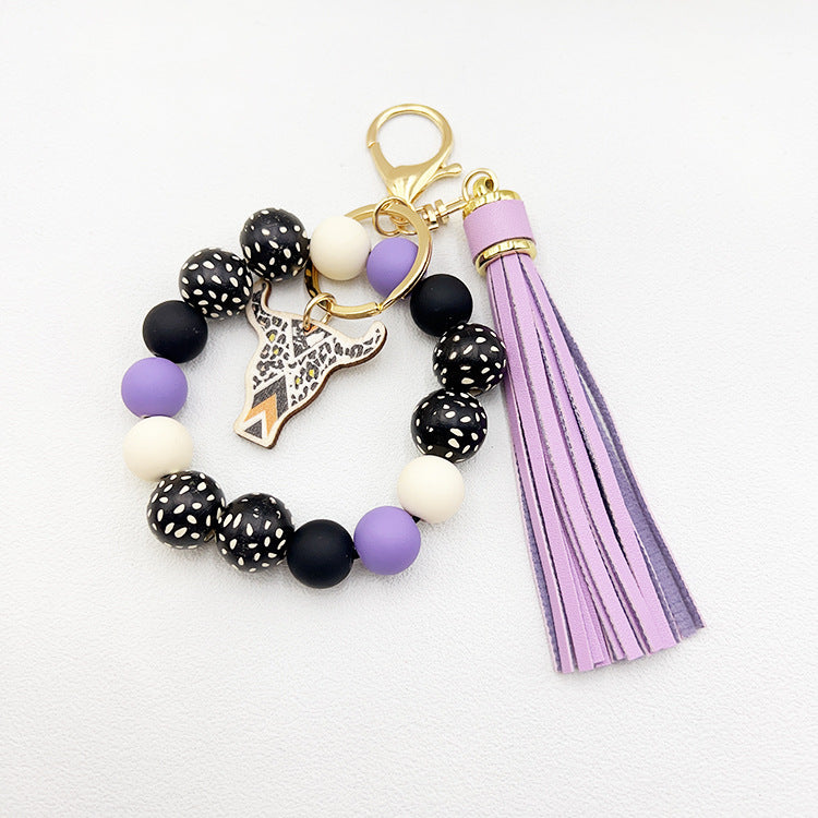 Wholesale Wooden Ox Head Sesame Spotted Wooden Beads PU Tassel Wrist Keychain
