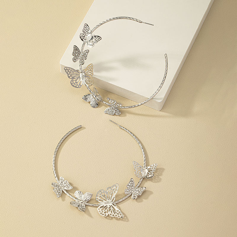 Pendientes de aleación de mariposas de diamantes al por mayor