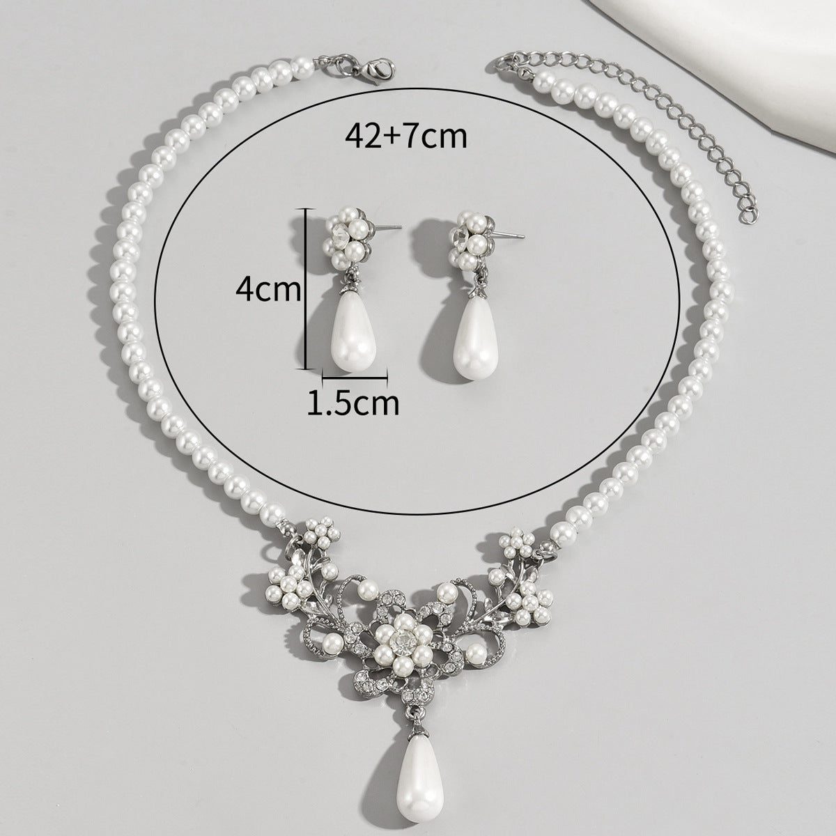 Wholesale Retro Atmospheric Style Pearl Inlaid Zircon Plum Blossom Design Earrings and Necklace Set