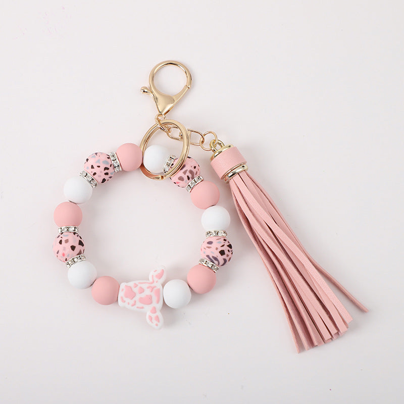 Llavero de muñeca de silicona de borla al por mayor