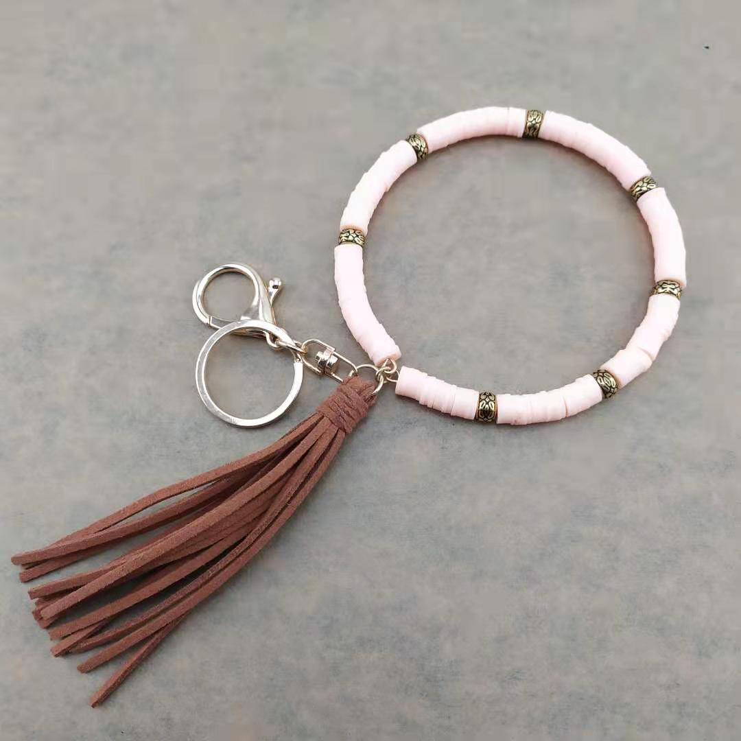 Llavero de muñeca de borla de arcilla colorida al por mayor