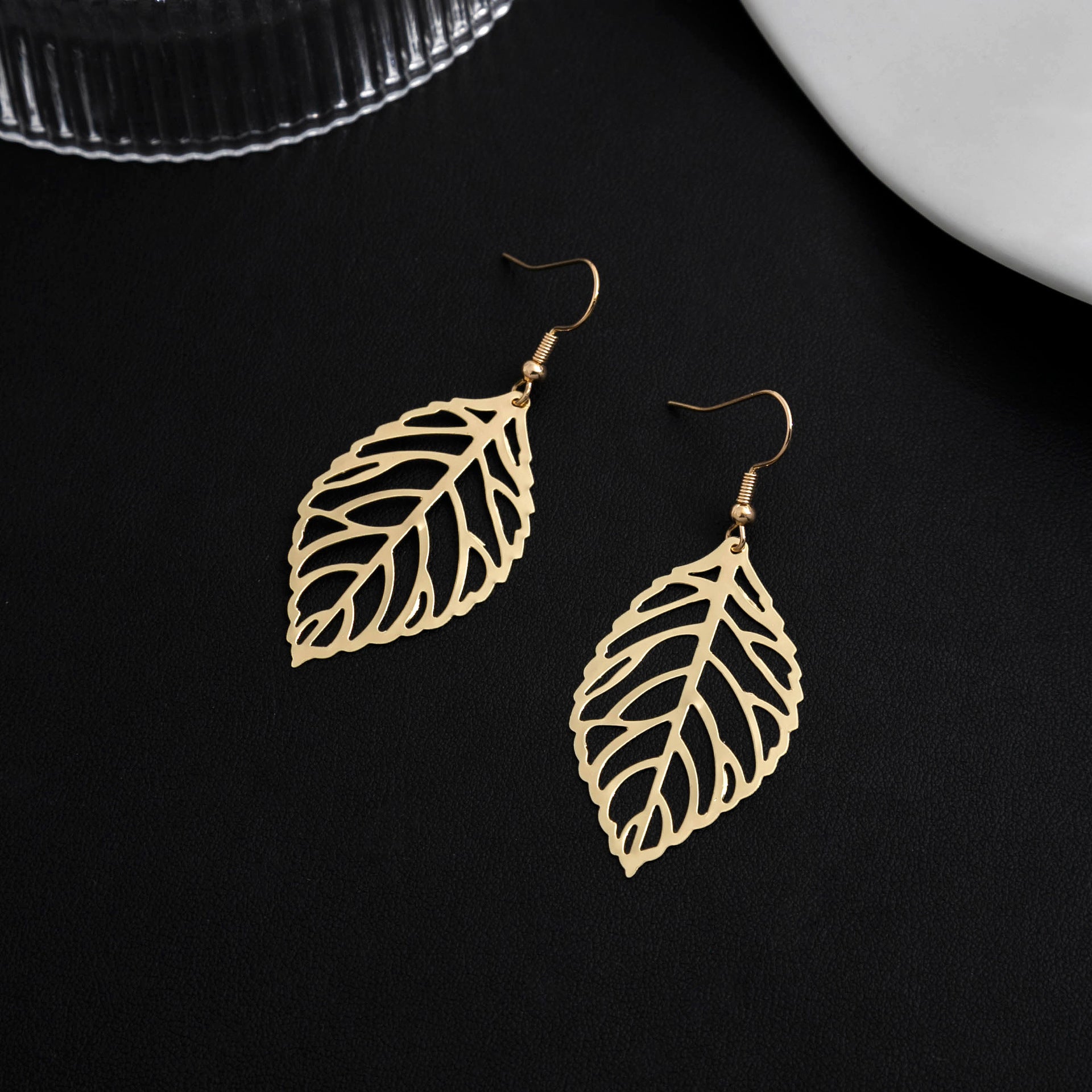 Wholesale Creative and simple forest style metal leaf earrings, ear studs and earrings