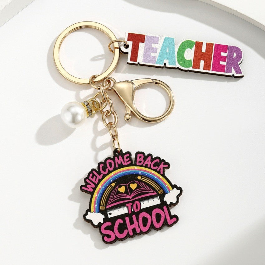 Wholesale Campus style graduation season wooden book keychain