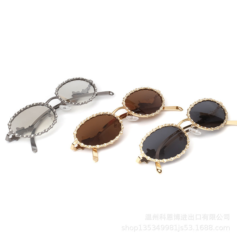 Wholesale Small frame diamond encrusted oval metal pentagram sunglasses