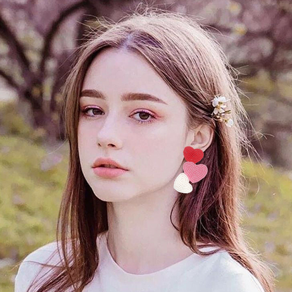 Wholesale  fashion temperament handmade three heart rice beads irregular earrings earrings Valentine's Day