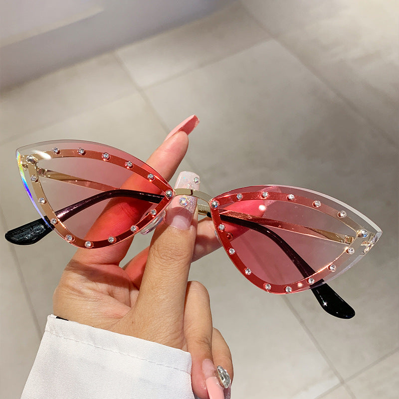 Wholesale Colorful rimless diamond cat-eye sunglasses