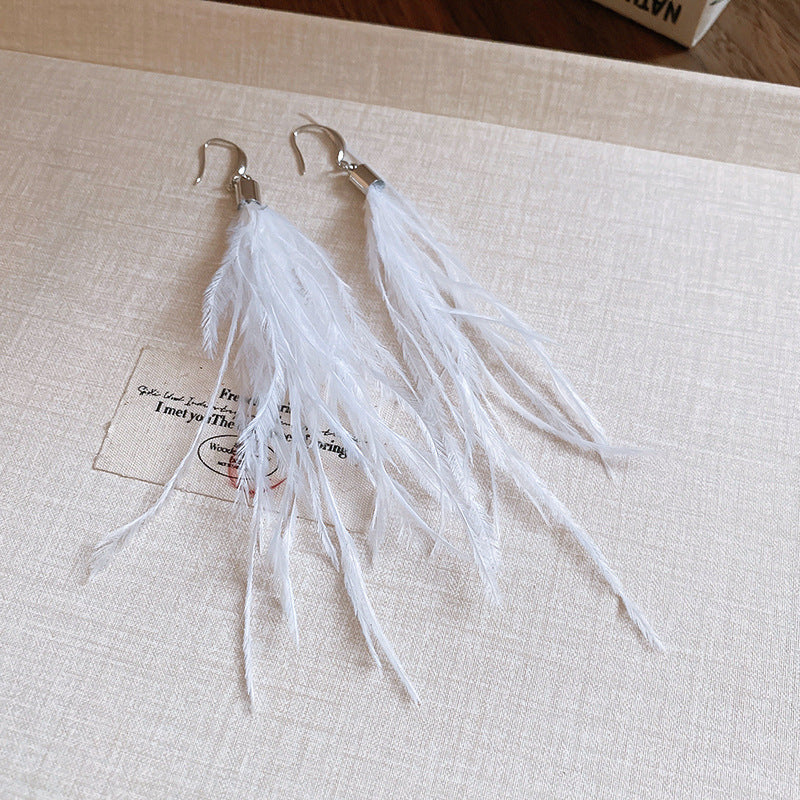 Wholesale Diamond studded bow feather tassel earrings