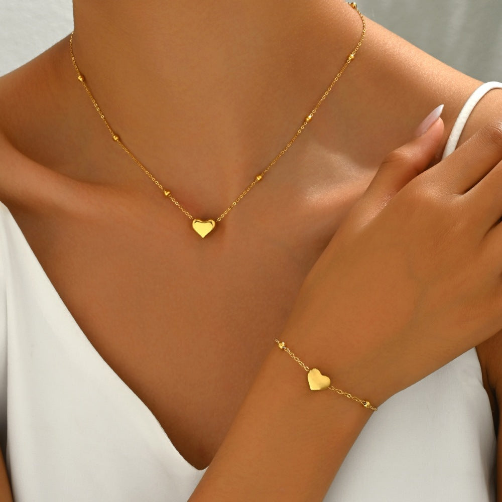 Wholesale Stainless steel gold heart shaped necklace and bracelet