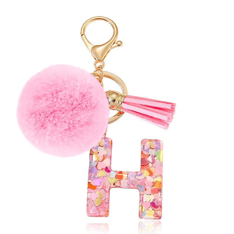 Wholesale Hairball English 26 letter pink Pom Pom keychain
