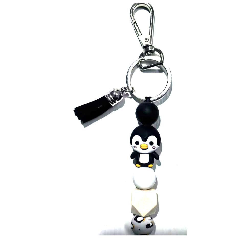 Wholesale Silicone Bead Cartoon Cow Keychain Bag Charm For Couple Birthday Gift And Everyday Use