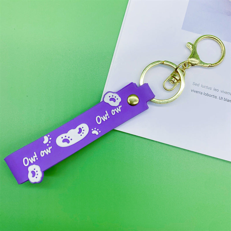 Al por mayor 10pcs PVC Dog Claw Cat Claw Keychain Rope de cuero