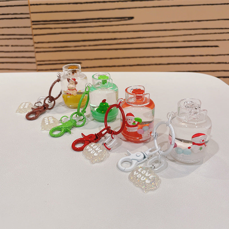 Cadena de llave de la serie de la serie de Navidad llena de aceite de acrílico con botella con botella con botella