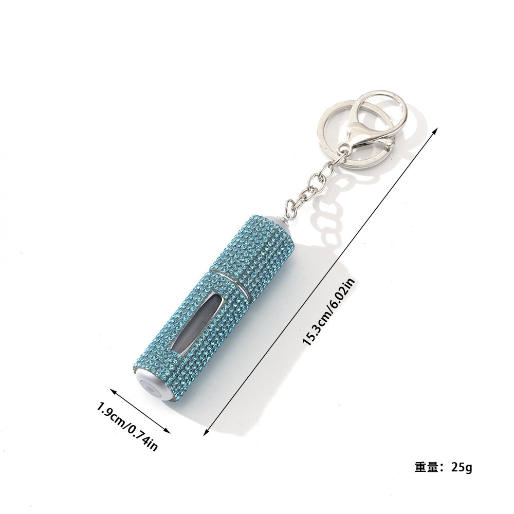 Wholesale  diamond-studded creative perfume bottle keychain is easy to carry