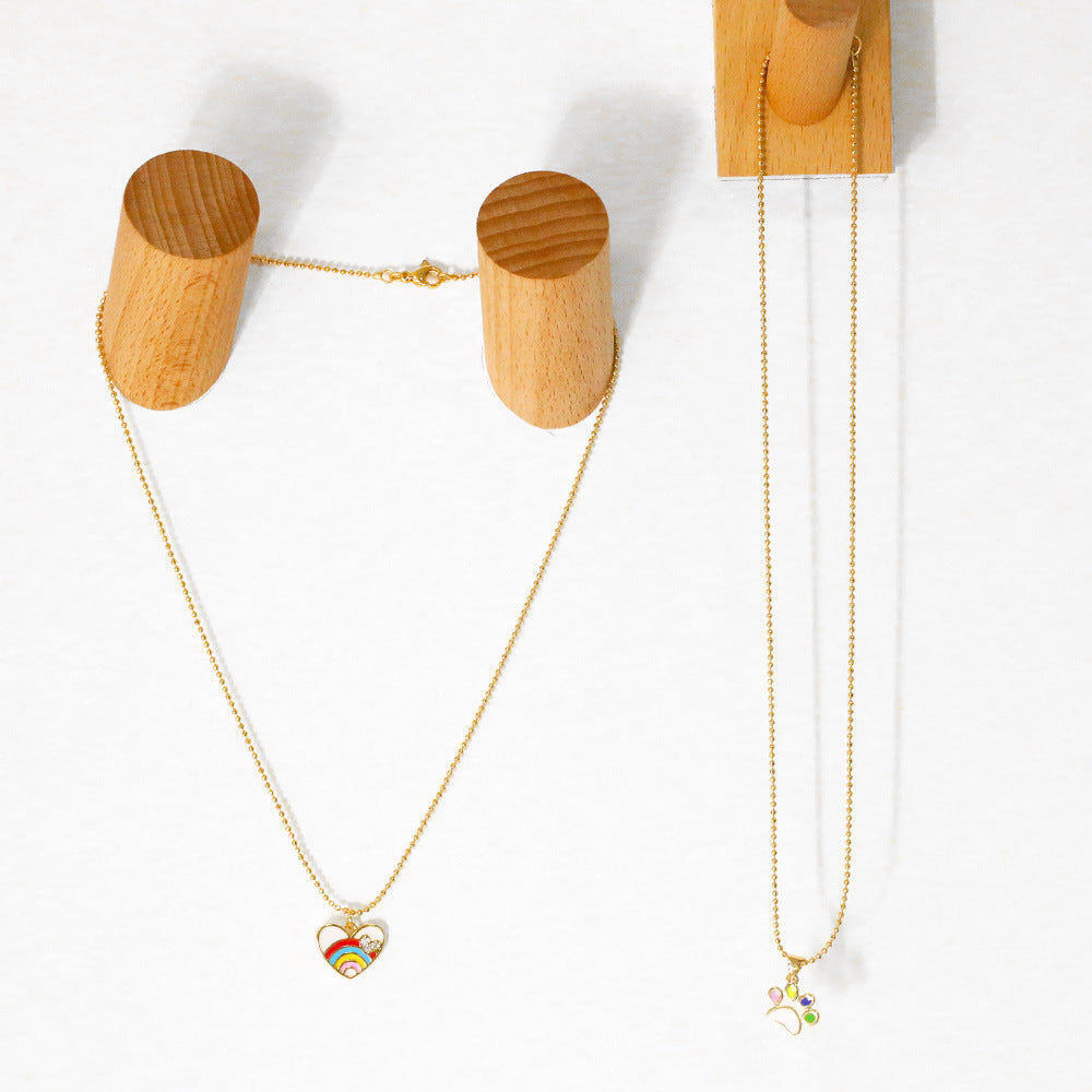 Wholesale colorful enamel dog paw print pendant clavicle chain simple sweater chain plated with 18K gold