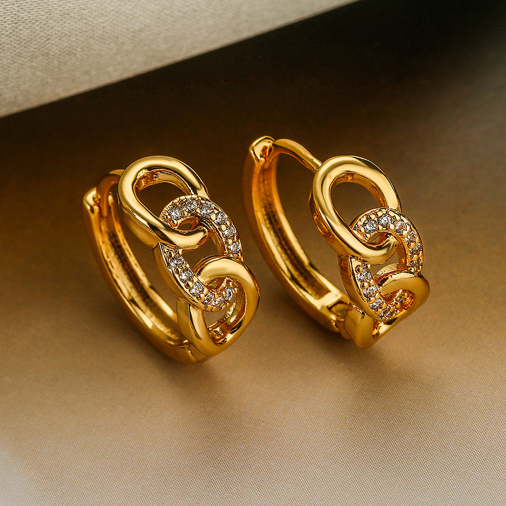 Pendientes geométricos de circón de oro de cobre al por mayor chapado en 18K