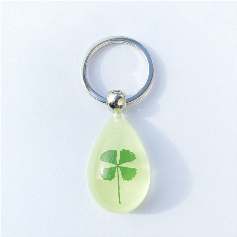 Wholesale 12pcs Four-leaf Clover Luminous Keychain