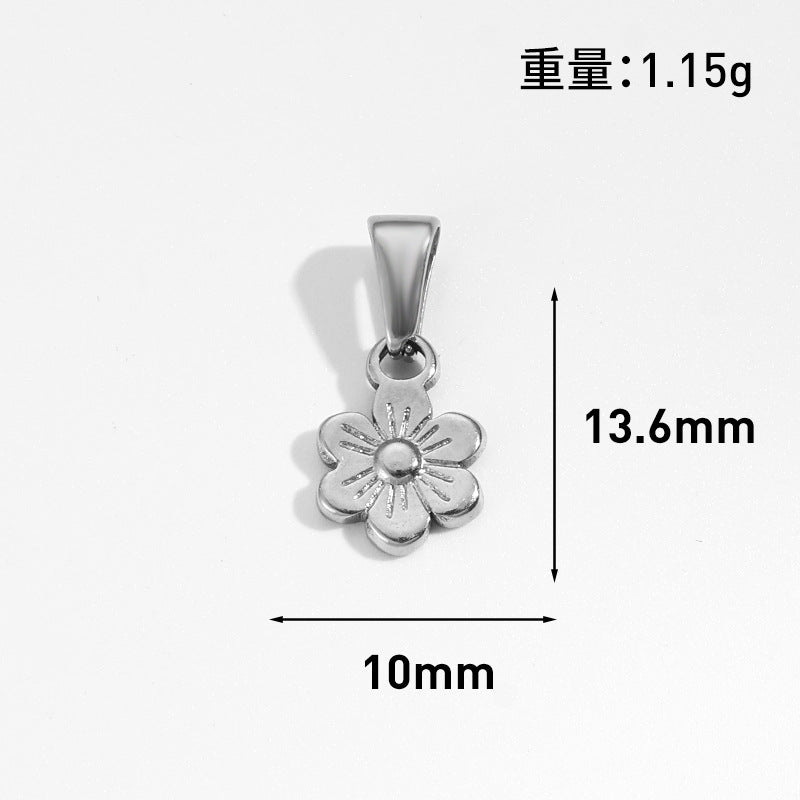 Wholesale 10pcs Retro flower heart-shaped hollow geometric stainless steel pendant