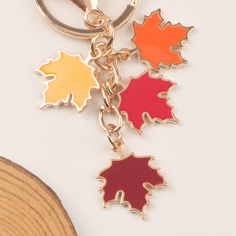 Wholesale Zinc Alloy Pearl Maple Leaf Car Keychains