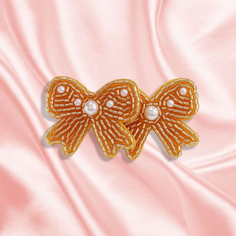 Wholesale Bohemian Handmade Rice Bead Bow Earrings