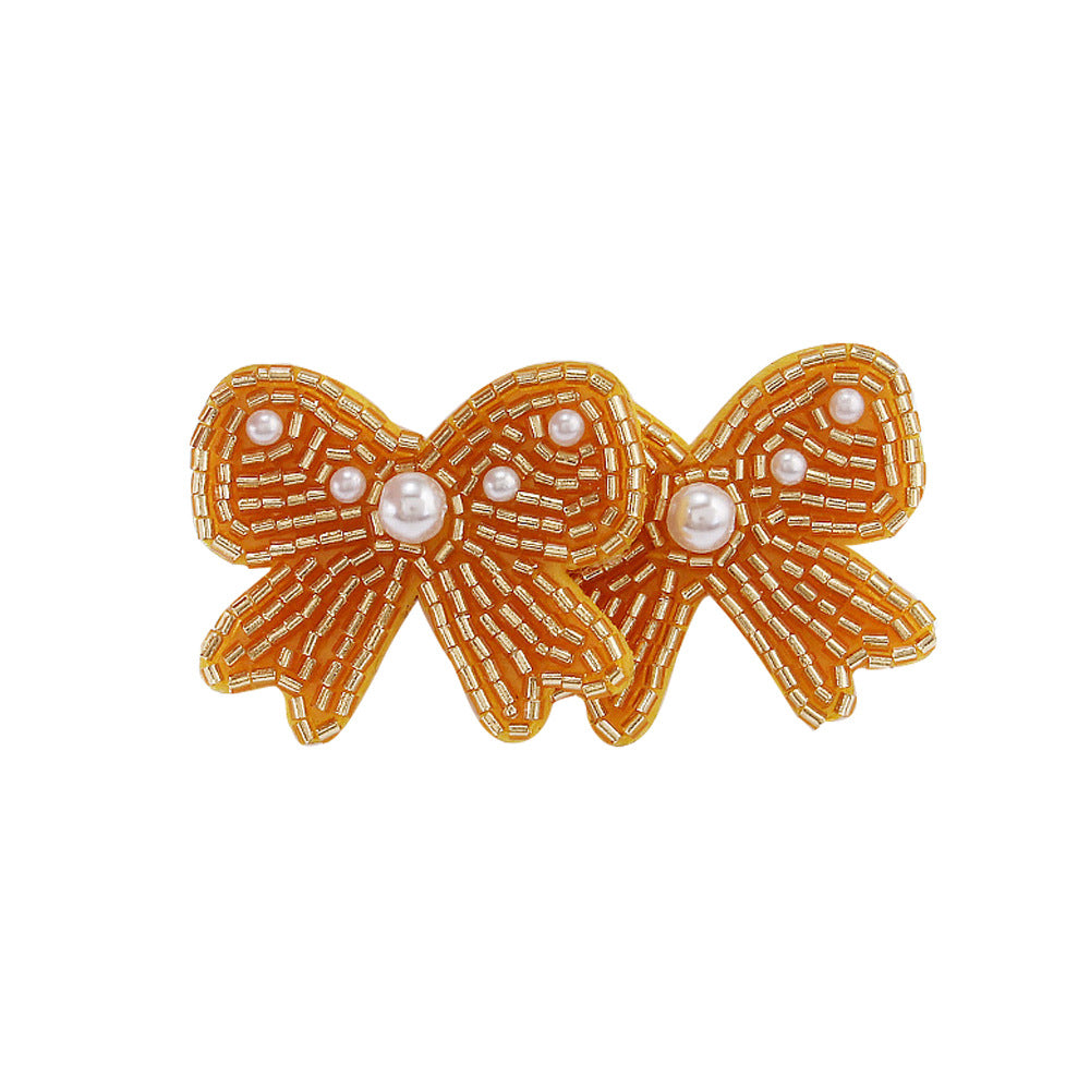 Wholesale Bohemian Handmade Rice Bead Bow Earrings