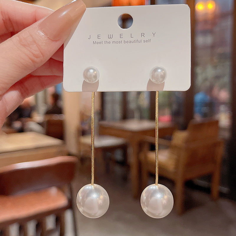 Wholesale of Long Tassel Pearl Alloy Earrings