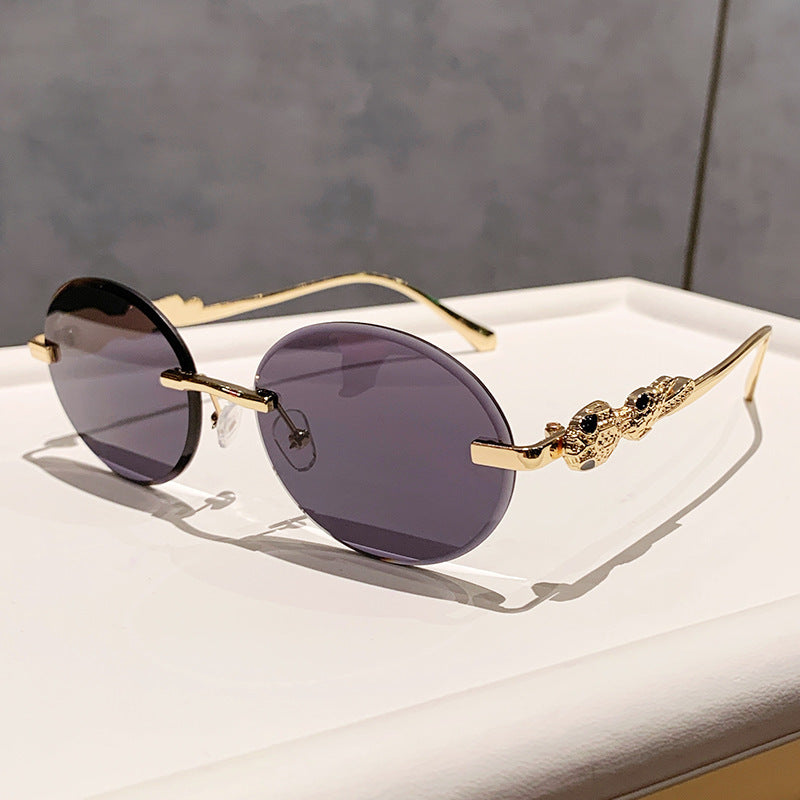 Wholesale Retro oval frameless sunshade sunglasses