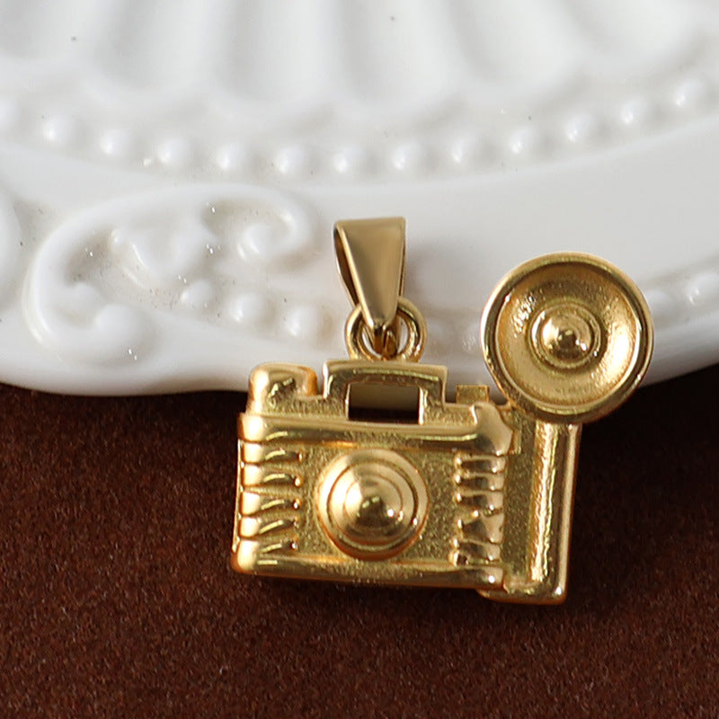 Wholesale 10pcs Stainless steel camera bow and arrow game console sun pendant