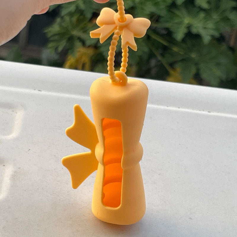 Wholesale Lipstick case silicone protective case bow lipstick bag keychain