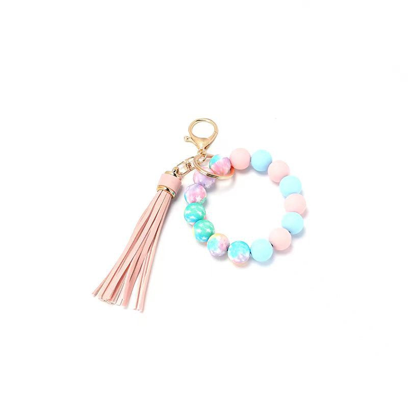 Wholesale Silicone Food Grade Cartoon Tassel Printed Silicone Wrist Keychain
