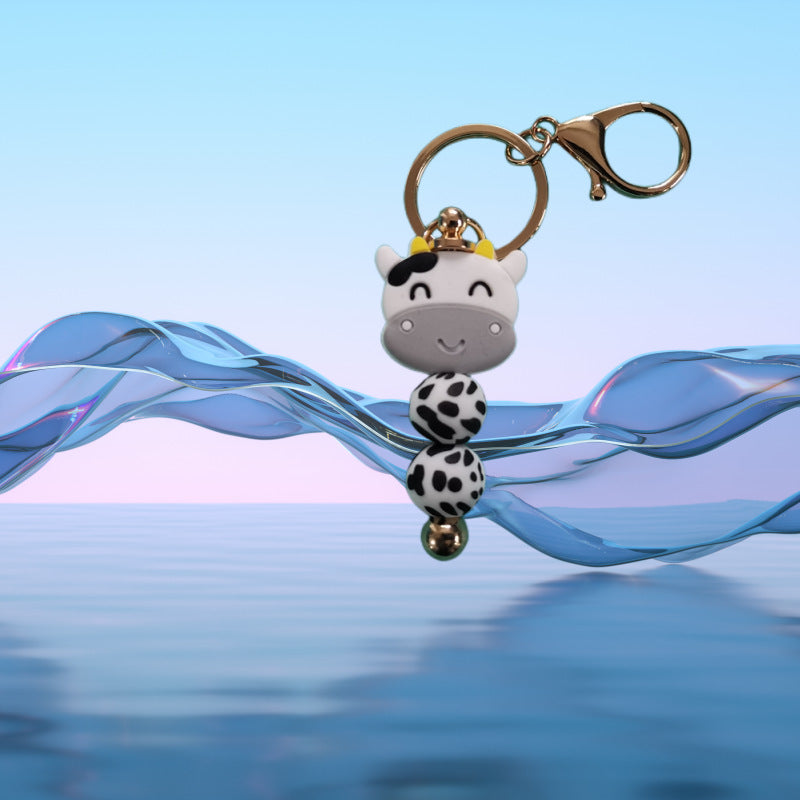 Llavero con cuentas de vaca de silicona al por mayor