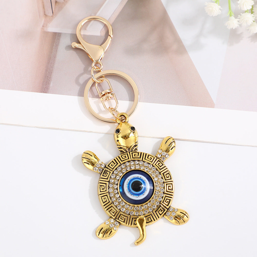 Wholesale Devil' s Eye Turtle Blue Eyes with Water Diamond Metal Keychain