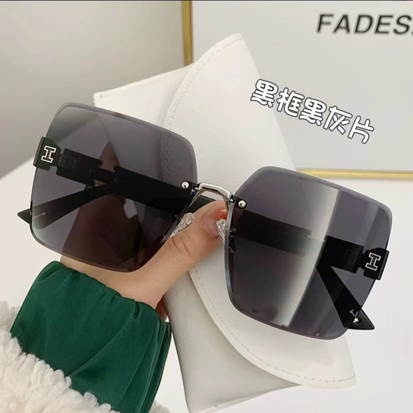 Wholesale Frameless Trimmed Large Frame Gradient Lens Sunglasses