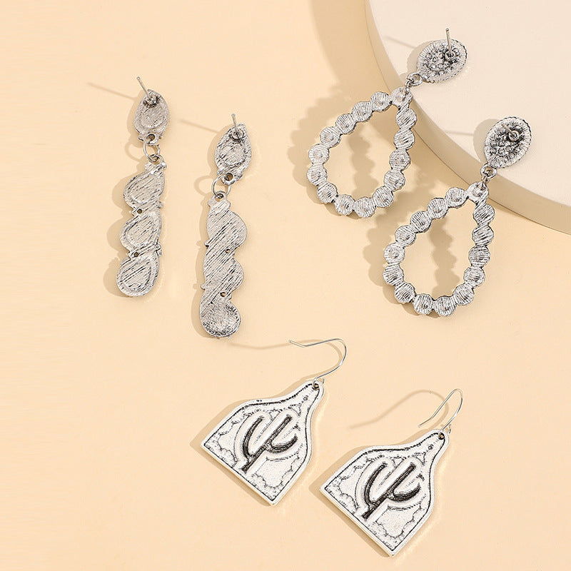 Wholesale Western style retro teardrop-shaped turquoise alloy earring set