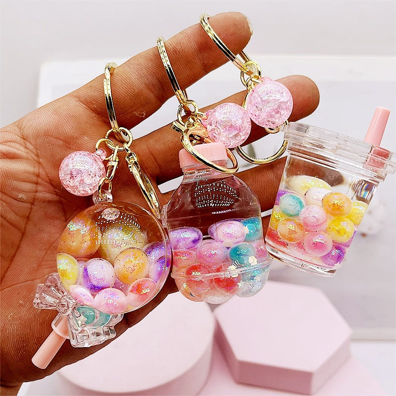 Botella de deriva acrílica al por mayor cuentas coloridas de botella y cadena de llave de botella