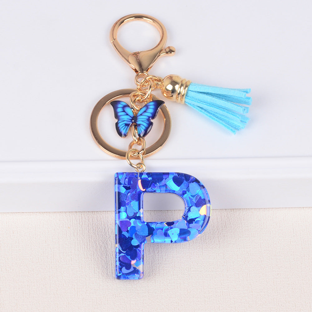 卸売ブルーラブバタフライタッセルレター樹脂キーホルダー
