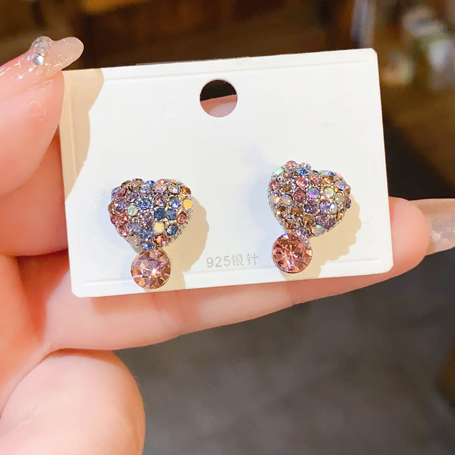 Wholesale Diamond studded bow with heart-shaped four leaf petal earrings