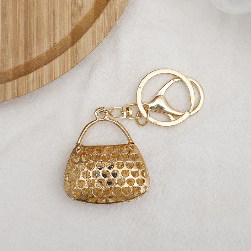 Wholesale Zinc Alloy Rhinestone Lipstick Perfume Bottle Keychain