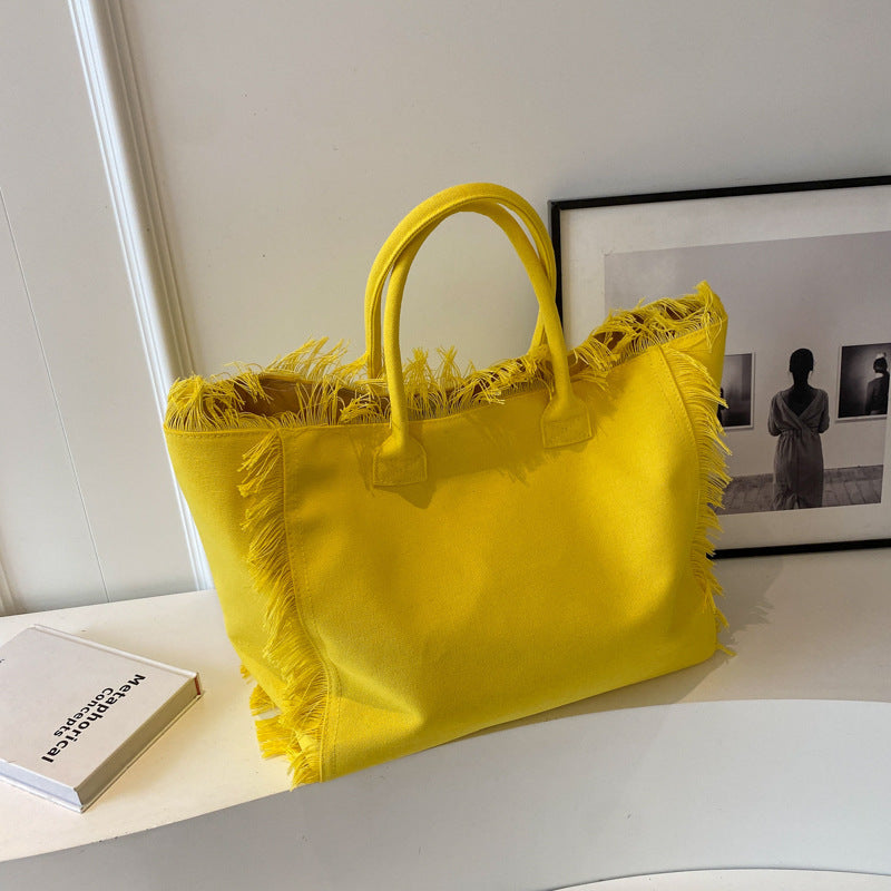 Wholesale Letter Tassel Simple Commuter Large Capacity Shoulder Canvas Bag