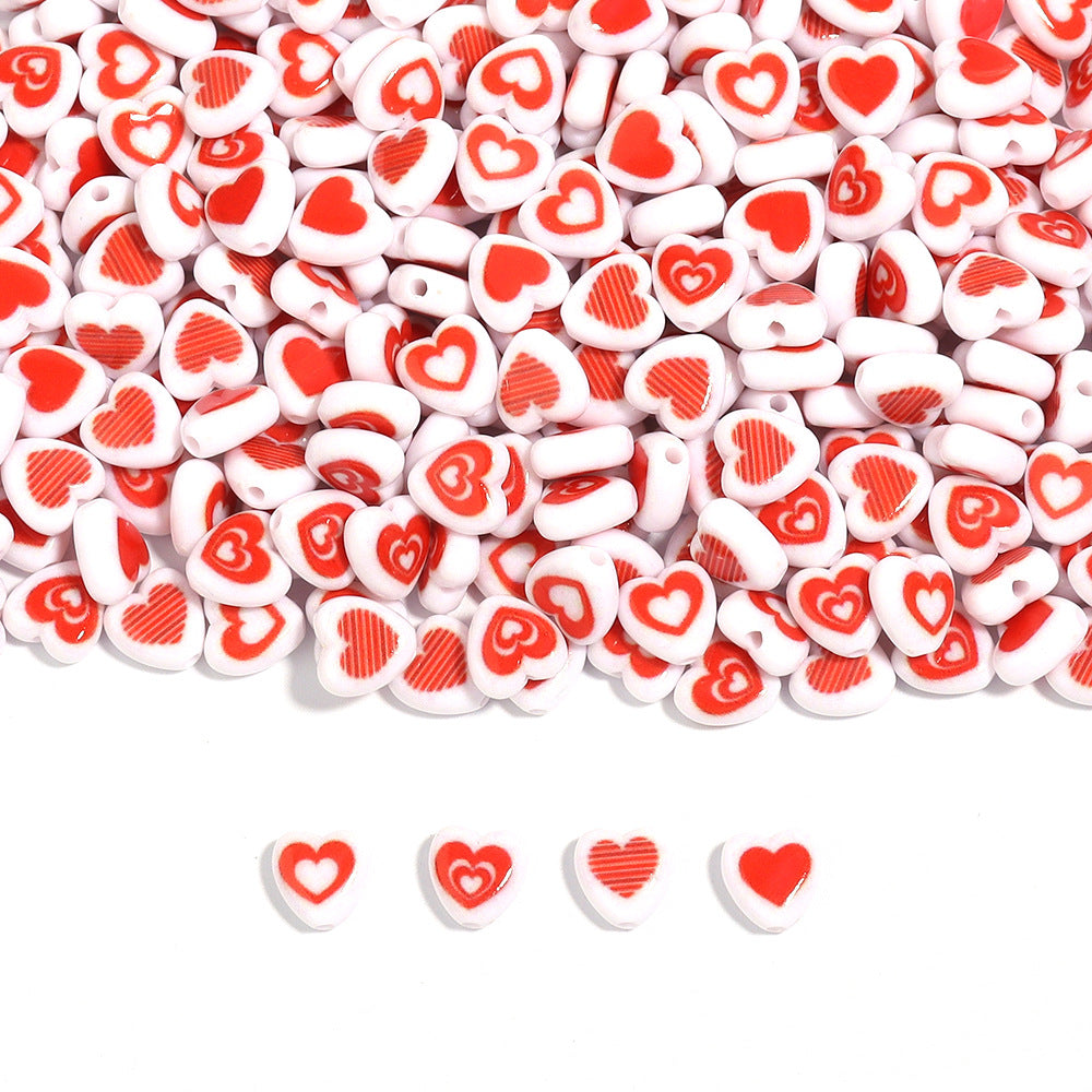 アクリル赤小サイズハート型縦穴ルースビーズ 100 個/パックの卸売