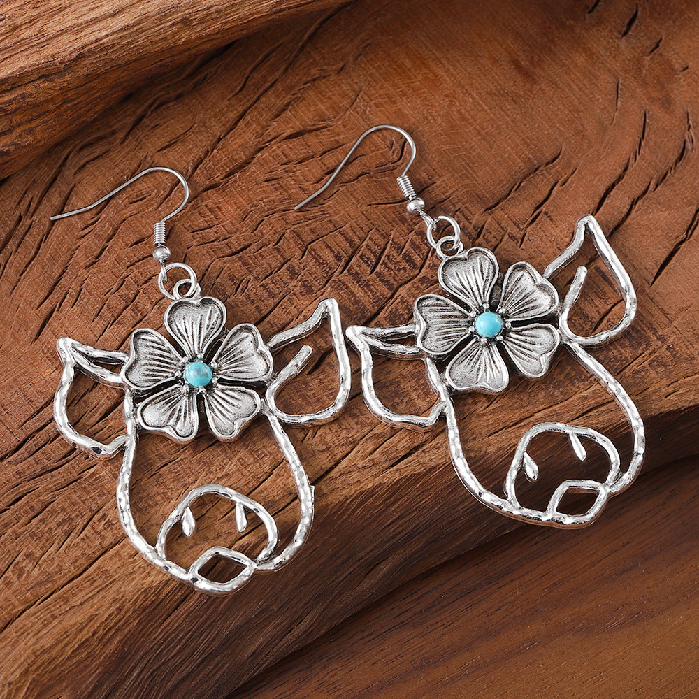 Wholesale hollow line inlaid turquoise animal pendant earrings